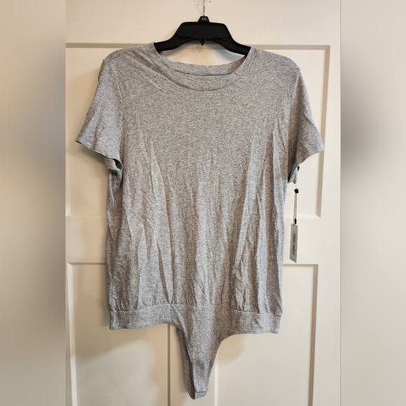 Calvin Klein body suit. Size Large. Nwt - Picture 1 of 2